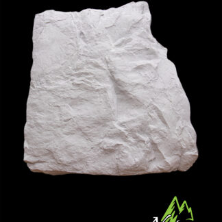 A large, irregularly shaped slab of white Reproduction Rock is displayed against a black background. The bottom right corner shows the Nature by Klaus logo with green stylized mountains and white text.